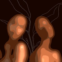 two people standing in front of a plant